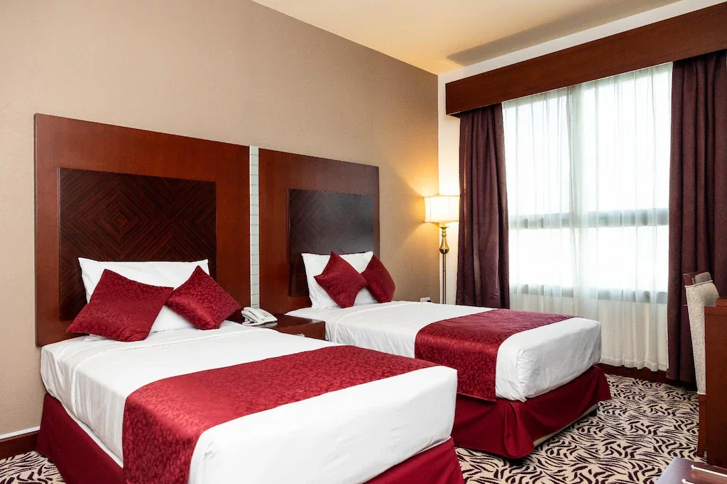 Twin bedroom at MRA Grand Hotel, Bur Dubai